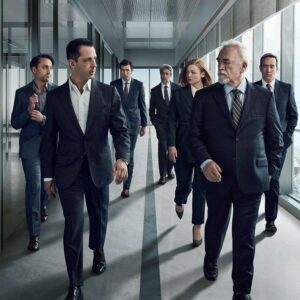 The Roy family from Succession walks down a hallway. Succession's horror story is about family power struggles and corporate intrigue.