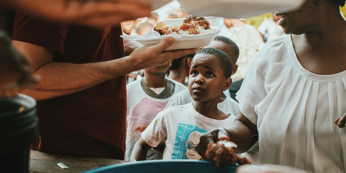 Can beggars be choosers? Food distribution to children in need. Charity and compassion.