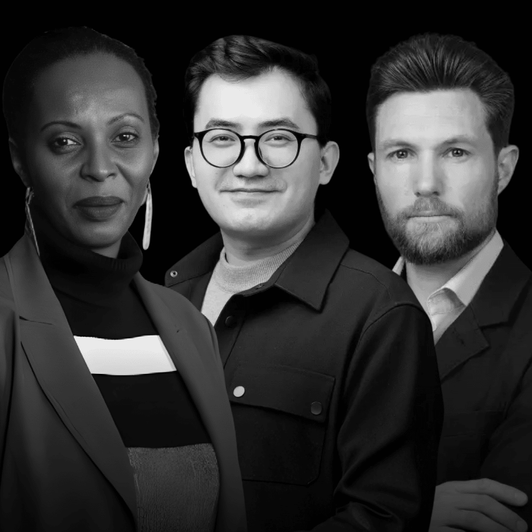 In Conversation with Sam Koslowski & Zara Seidler: Black and white studio shot featuring three individuals in professional attire.