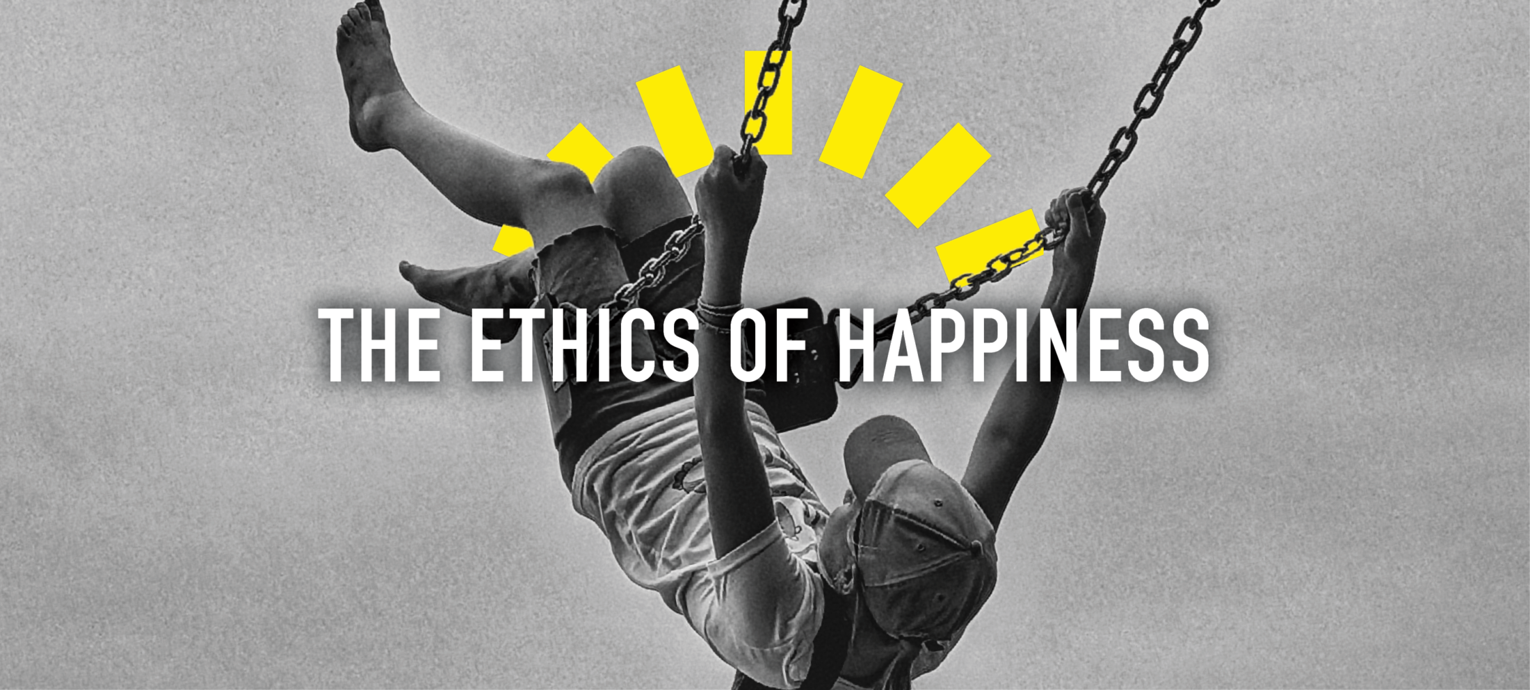 Black and white image of a child hanging upside down on a swing with yellow graphic accents, illustrating the ethics of happiness.